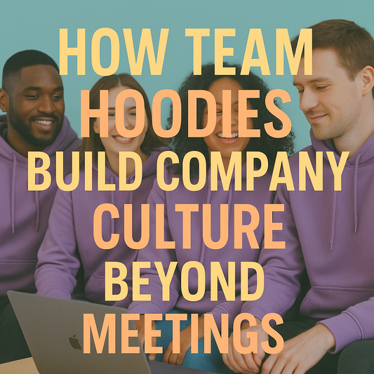 A group of diverse young professionals in pastel purple hoodies share a laugh while working together on a laptop in a bright, modern office. Large yellow text reads “How Team Hoodies Build Company Culture Beyond Meetings.”
